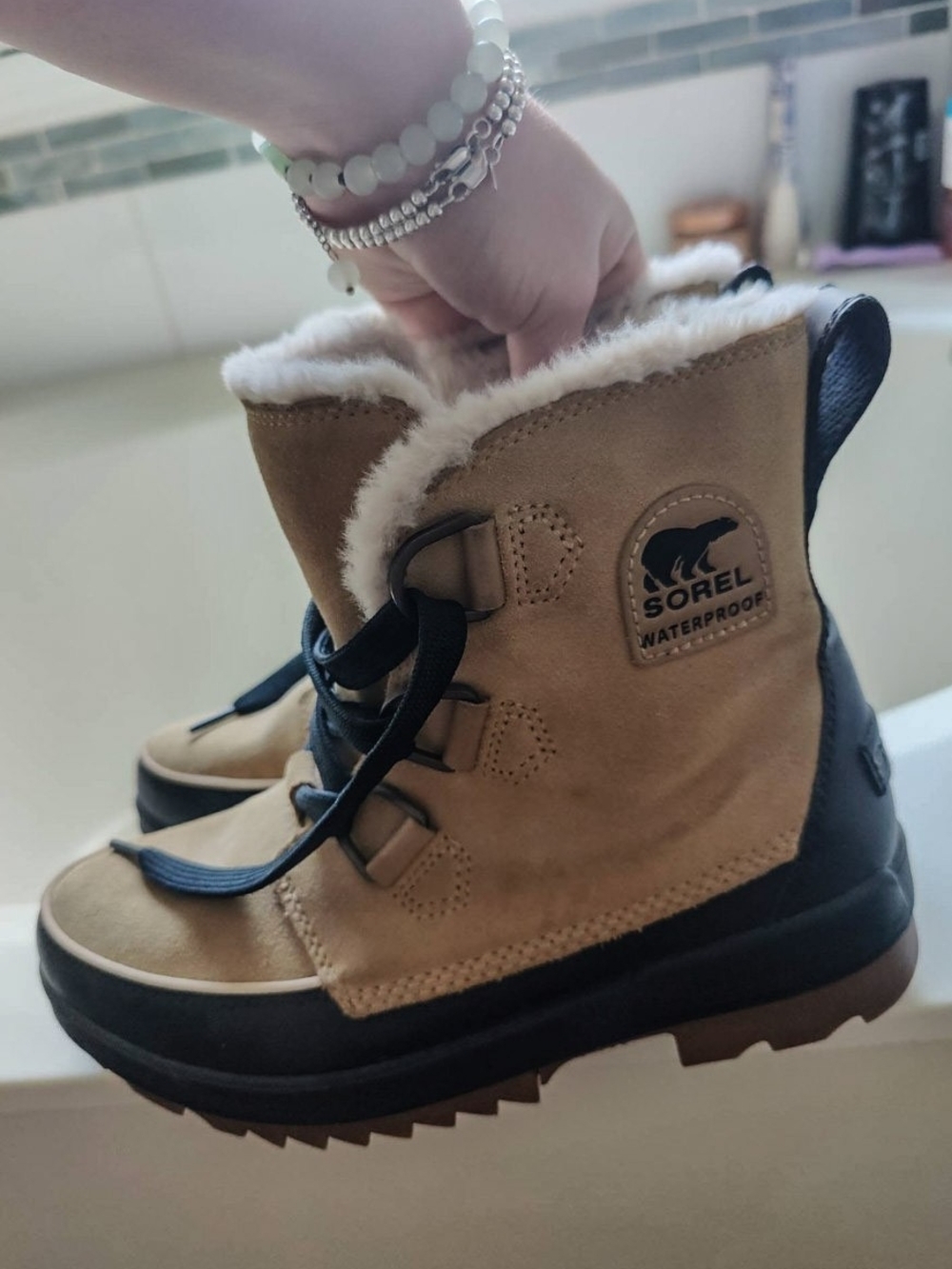 Sorel Women's Tan and Black Waterproof Winter Boots with Faux Fur Trim